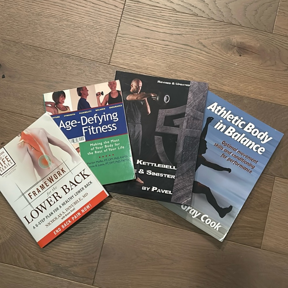 4 FITNESS BOOKS!!    LIKE NEW